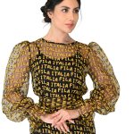 Black dress with yellow writing